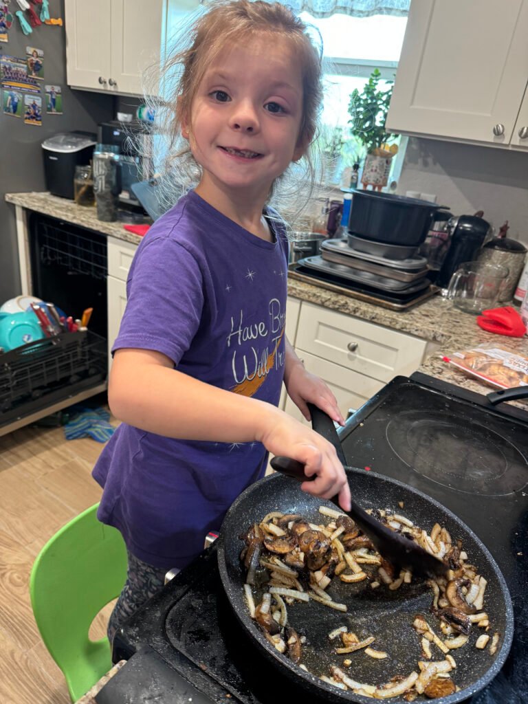 daughter cooking in the kitchen homemaking